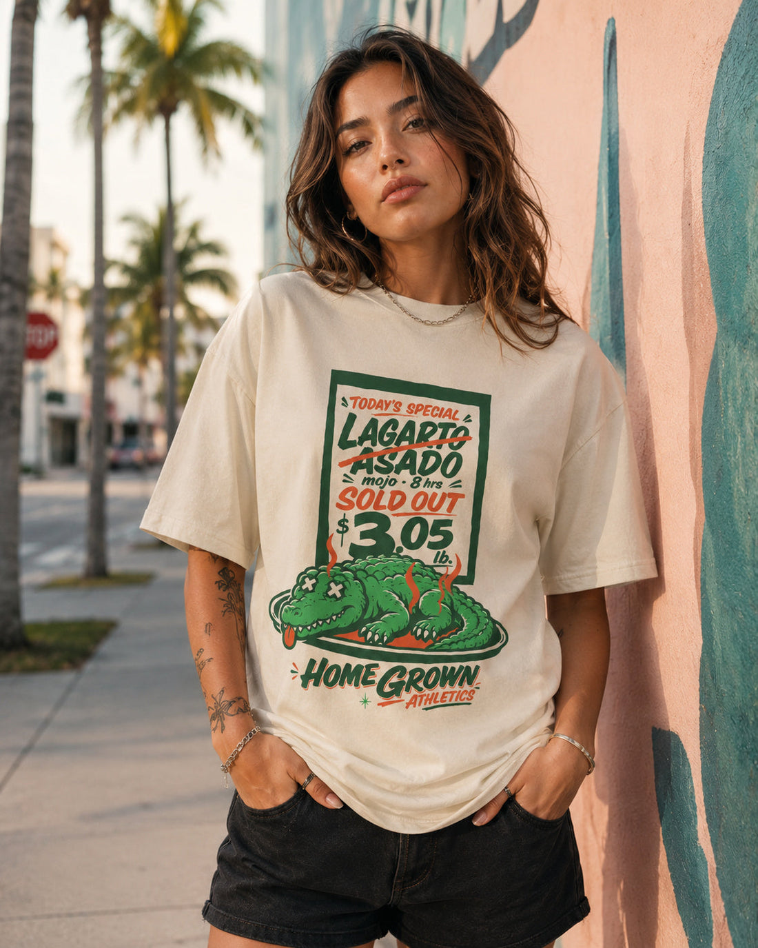 Model wearing the natural Lagarto Asado tee in Miami